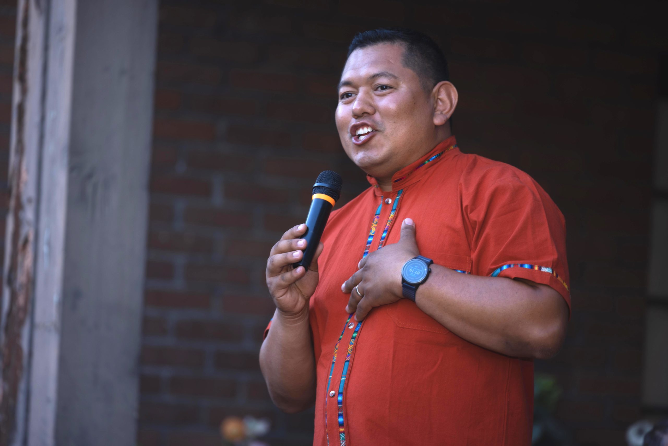 Victor Preciado speaking to supporters at a campaign celebration